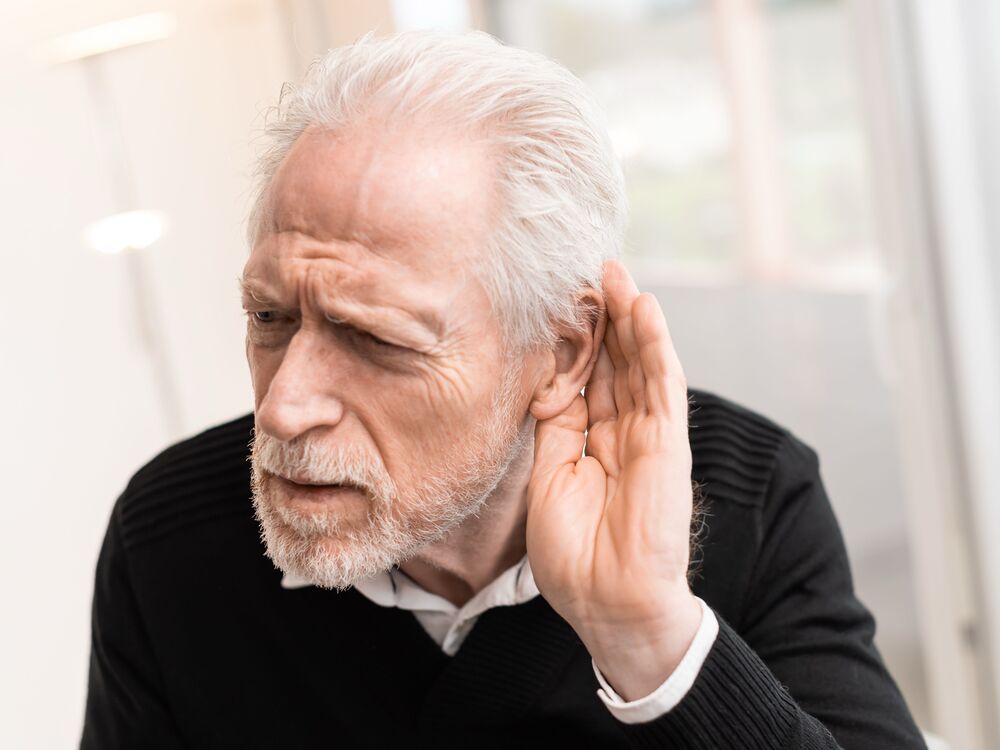 Patient learning about hearing loss treatment at Optimum Audiology in Apple Valley, CA