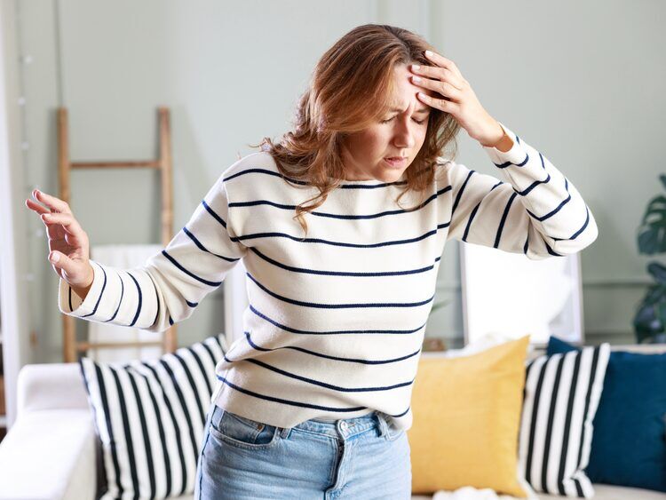 Patient undergoing dizziness and balance testing at Optimum Audiology in Apple Valley, CA